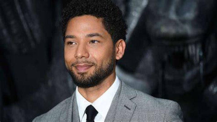 Actor Jussie Smollett poses for a selfie outside the Leighton Criminal Court Building after a hearing Tuesday, March 26, 2019, in Chicago. Smollett attorneys Tina Glandian and Patricia Brown Holmes said in a statement Tuesday that Smollett's record "has been wiped clean." Smollett was indicted on 16 felony counts related to making a false report that he was attacked by two men who shouted racial and homophobic slurs. (AP Photo/Amanda Seitz)