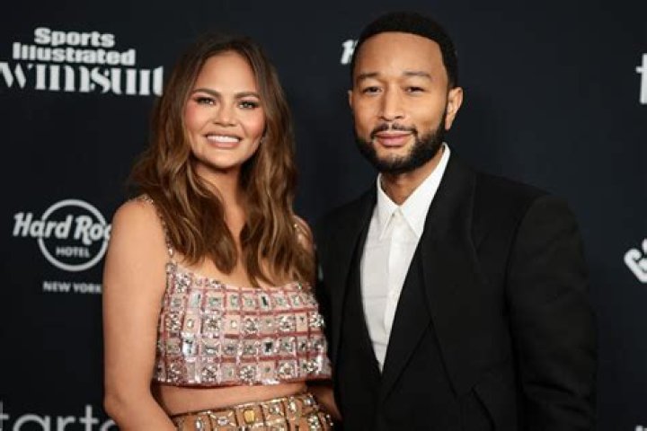Chrissy Teigen, left, and John Legend arrive for the State Dinner with President Joe Biden and French President Emmanuel Macron at the White House in Washington France, Washington, United States - 01 Dec 2022