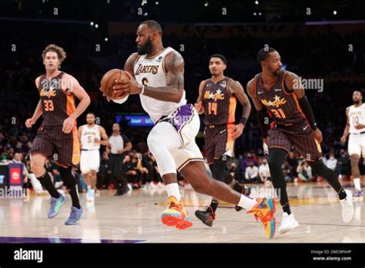 Los Angeles Lakers forward LeBron James dribbles during the second half of the team's NBA basketball game against the Portland Trail Blazers on Wednesday, Nov. 14, 2018, in Los Angeles. The Lakers won 126-117. (AP Photo/Mark J. Terrill)