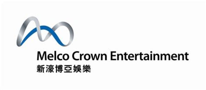 Melco Crown Entertainment's Co-chairman, James Packer, right, and singer Mariah Carey pose on the red carpet of the opening ceremony for the Studio City project in Macau, Tuesday, Oct. 27, 2015. (AP Photo/Kin Cheung)