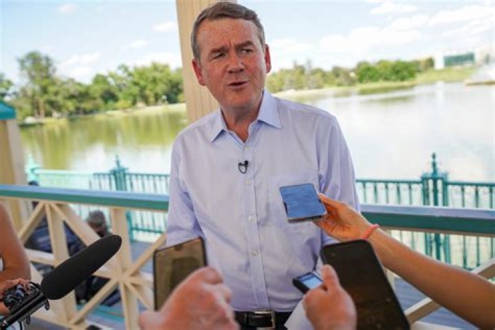 Michael bennet. U.S. Senator Michael Bennet, D-Colo., greets voters before U.S. Senator Bernie Sanders speaks during a rally with young voters on the campus of the University of Colorado, in Boulder, Colo. Sanders is riding a bus around the state with Democratic candidates to drum up support for them before Election Day Election 2018 Senate Colorado - 24 Oct 2018