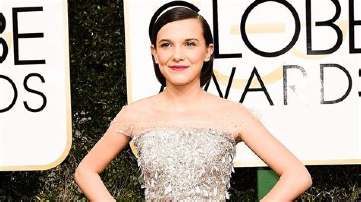 Millie Bobby Brown hits the beach as she films a scene for her new movie 'Electric State'. The British actress, 18, was seen in a white T-shirt as she walked across the sand during filming in Acworth, Georgia. 24 Oct 2022 Pictured: Millie Bobby Brown. Photo credit: OG/MEGA TheMegaAgency.com +1 888 505 6342 (Mega Agency TagID: MEGA910806_016.jpg) [Photo via Mega Agency]