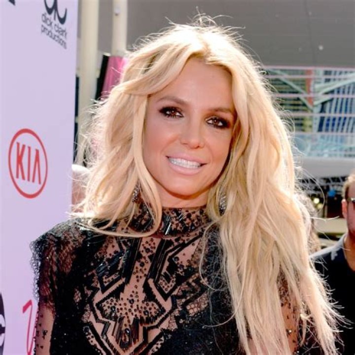 Singer Britney Spears spends the day at Will Rodgers State Beach in Pacific Palisades, Ca with an unidentified male friend. the pop princess who was taking a break form her current US and European tour had fun as she frolicked along the beach and rode piggyback on her friends back and played with a dog that was strolling along the beach. britney and her friend then stopped to pick up some drinks at a local store before heading back to the Beverly Hills hotel where she is staying before her tour resumes on monday Britney Spears spends day at the beach, Pacific Palisades, California, USA - 23 Apr 2004